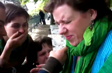 Girl painfully drinks beer through her ear