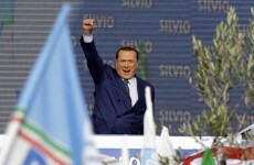 Thousands attend rally for Berlusconi - despite his conviction for tax fraud