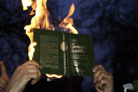Libyan protesters at the US Embassy burnt copies of Colonel Muammar Gaddafi's Green Book - the leader's 1975 political manifesto.