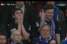 This unhappy Wigan fan expressed himself through the language of bird-flipping on TV