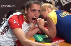 This screaming female arm wrestler will scare the bejeepers out of you