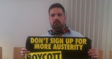 Property tax protesters chain themselves to chairs, radiator in Revenue office