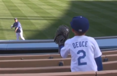 Baseball player makes young kid's day by playing catch with him