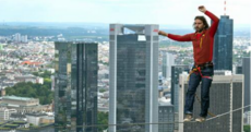 An Austrian man tip-toed along a line strung 185 metres off the ground yesterday