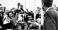 Can you name this little boy smiling at JFK during his visit to Ireland in 1963?