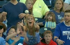 Little kid steals a baseball from a very excited woman
