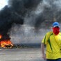 Brazil officials reverse subway and bus fare hikes as thousands protest