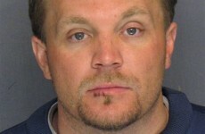Man charged after driving 35 miles with wife on car bonnet