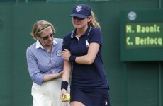 Wimbledon ball girl leaves court in tears after getting hit with a 128mph serve
