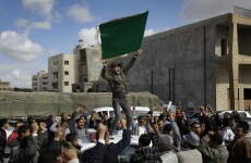 Gaddafi regains opposition-help city, but rebels gain oil port