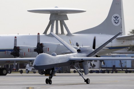 File photo of a Predator B unmanned aircraft taxis at the Naval Air Station in Corpus Christi, Texas