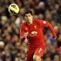 Luis Suarez flattered with interest from Arsenal