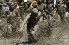 8 joyous photos of kids cooling off by diving into mud