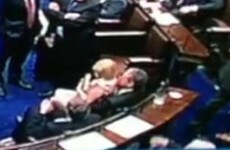 Male TD pulls female colleague into his lap - in the Dáil chamber