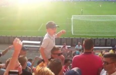 Young PSV fan leads the terraces in raucous chant