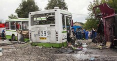 Moscow: At least 18 dead as bus cut in two by collision with truck