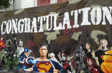 Thai university apologizes for putting Hitler and Superman on banner