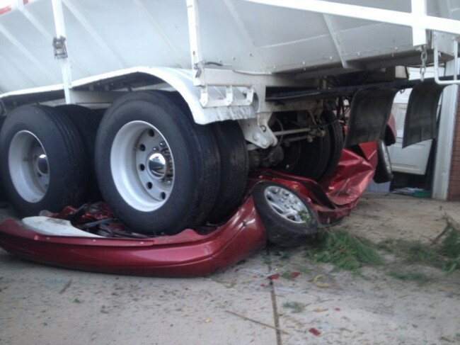 Runaway Truck Hits House