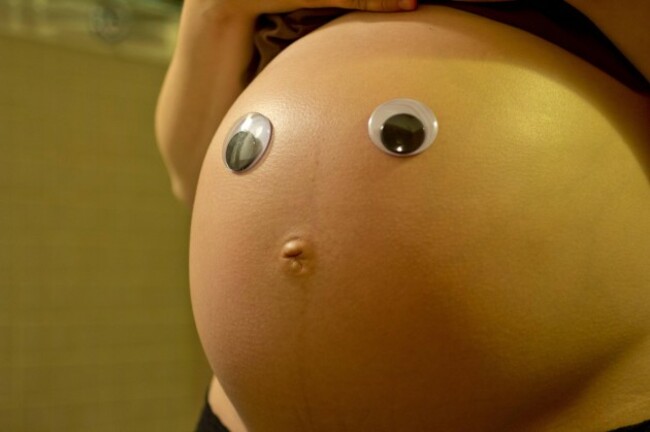 Put some googly eyes on my pregnant wife's belly. Result- complete success. - Imgur