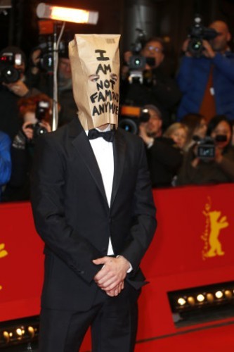 Shia LaBeouf arrives on red carpet with a paper bag over his head