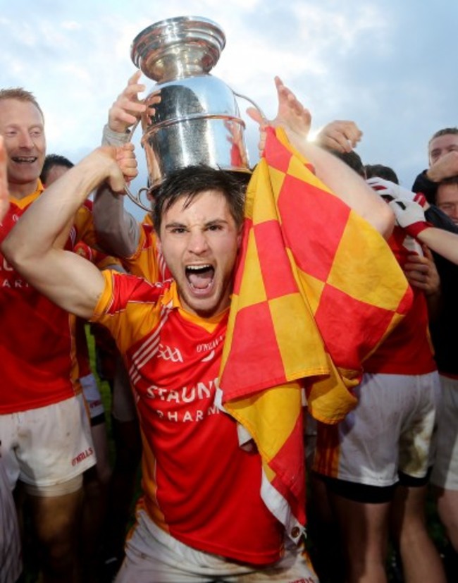 Donal Newcombe celebrates with the Moclair Cup