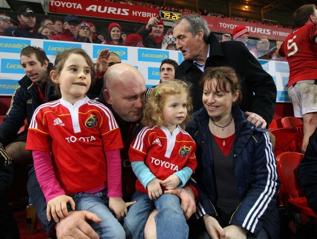 Munster's John Hayes at the end of the game with his daughters Sally and Roisin and wife Fiona