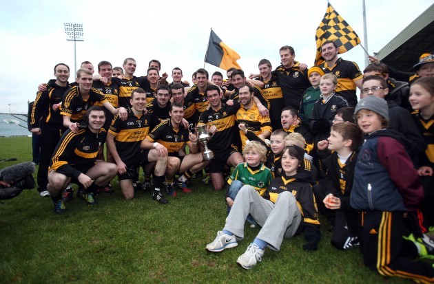 The Crokes team celebrate with supporters after the game