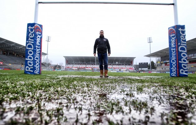 General view of the waterlogged pitch that caused the game to be called off