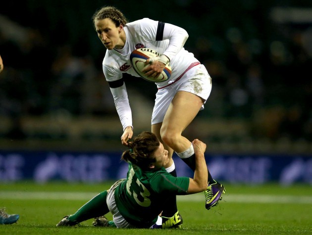 Katherine Merchant is tackled by Lynne Cantwell
