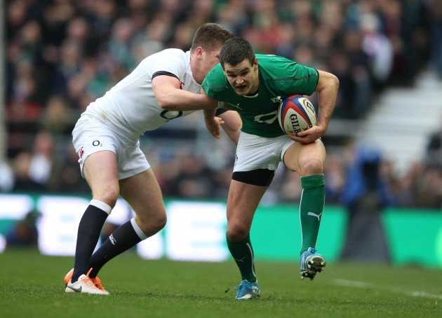 Jonathan Sexton is tackled by Owen Farrell