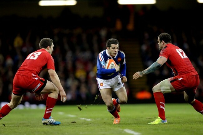Brice Dulin tries to get between George North and Jamie Roberts