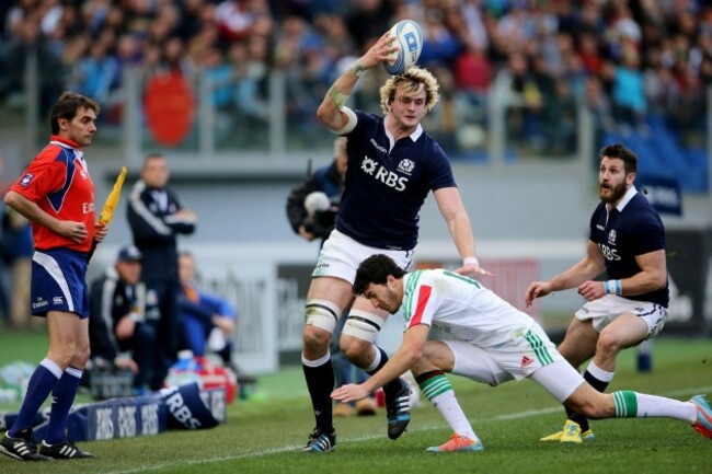 Leonardo Sarto tackles Richie Gray