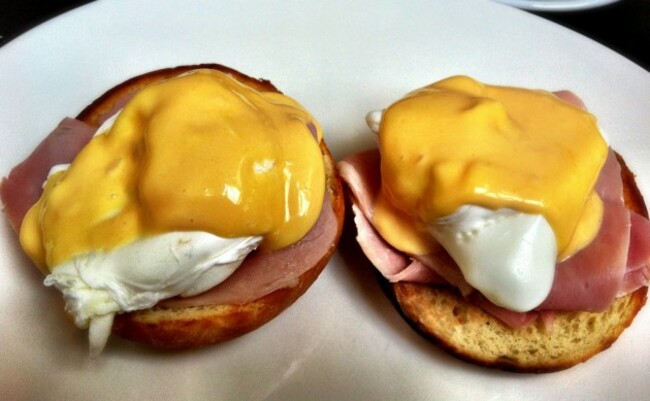 Eggs Benedict on brioche roll at Speakeasy