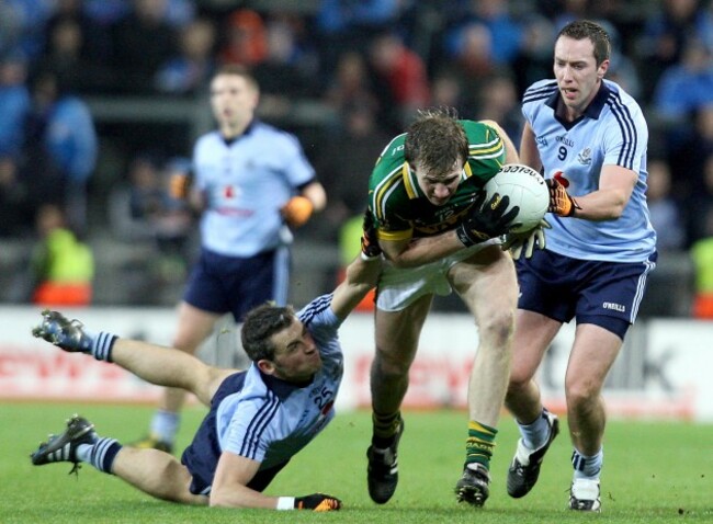 Alan Brogan and Barry Cahill with David Moran