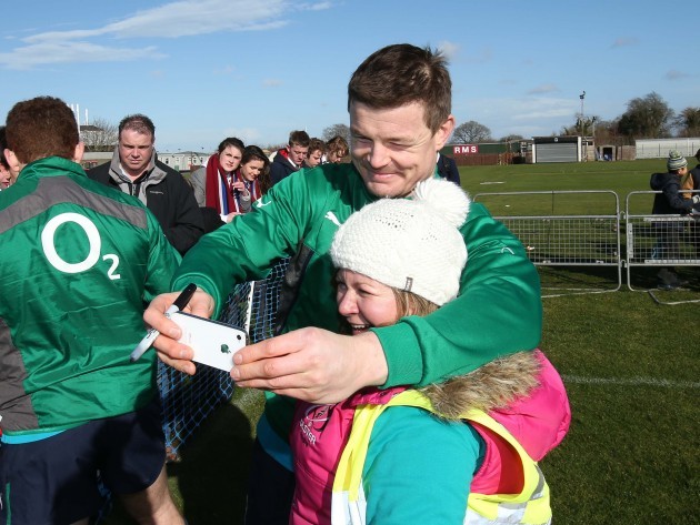 Brian O'Driscoll poses for a picture with a fan