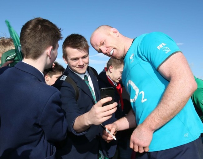 Paul O'Connell poses for a picture with a fan