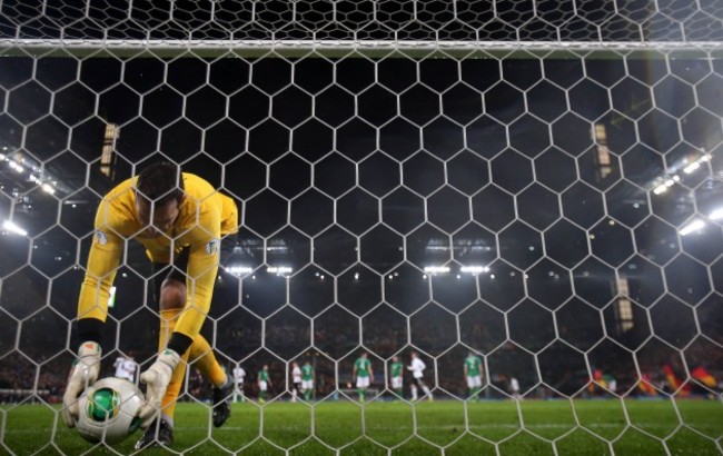 David Forde picks the ball out of the net after Sami Khedira opened the scoring