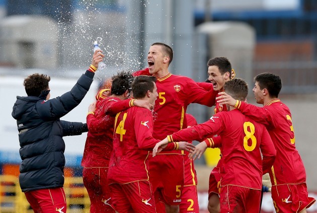 Montenegro players celebrate after the game