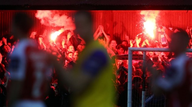 Dundalk supporters light flares