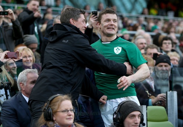 Brian O'Driscoll is congratulated by Ronan O'Gara after he is substituted