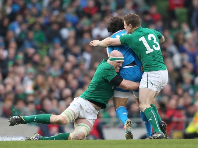 Paul O'Connell and Brian O'Driscoll tackle Luke McLean