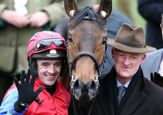 Ruby Walsh celebrates winning on Quevega with trainer Willie Mullins