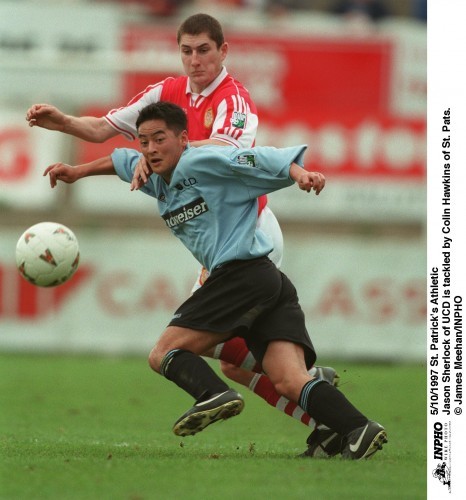 Jason Sherlock of UCD is tackled by Colin Hawkins of St. Patrick's Athletic 5/10/1997