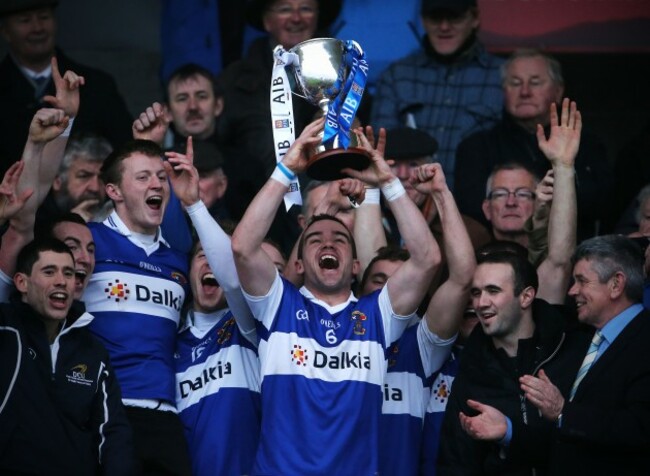 Ger Brennan lifts the cup