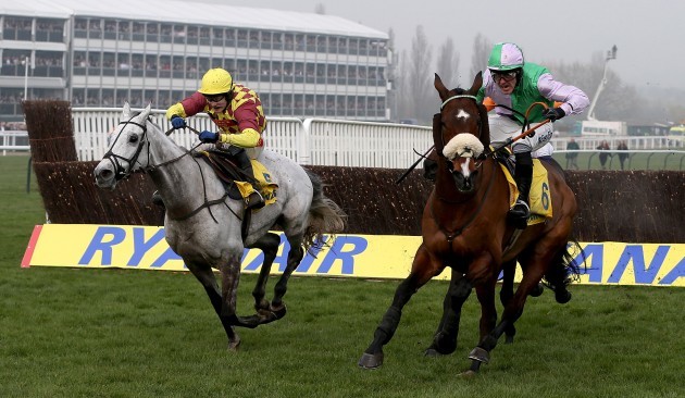 Dynaste ridden by Tom Scudamore (Left) beats Hidden Cyclone ridden by Andrew McNamara on the way to victory