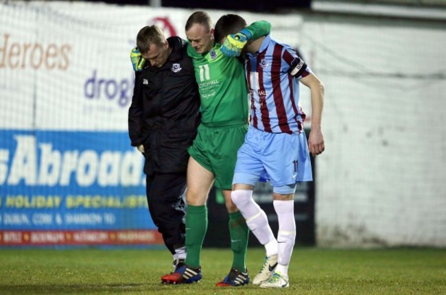 Micheal Schlingerman leaves the field injured