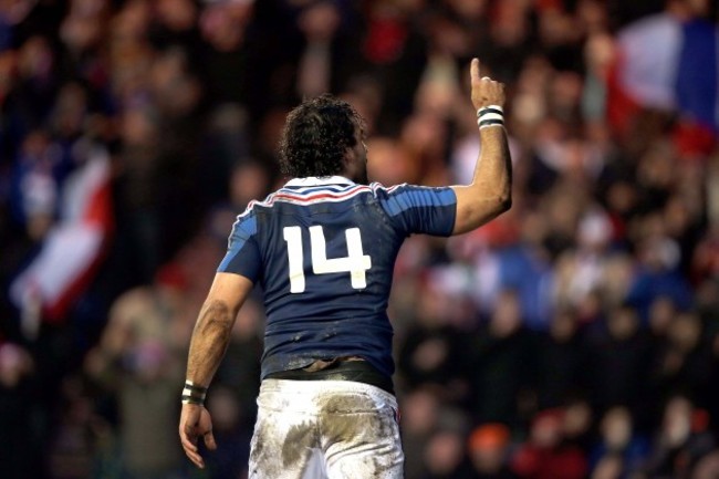 France's Yoann Huget celebrates scoring a try