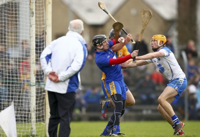 Donal Tuohy saves under pressure from Maurice Shanahan