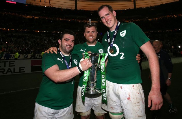 Martin Moore, Jamie Heaslip and Devin Toner celebrate with the trophy