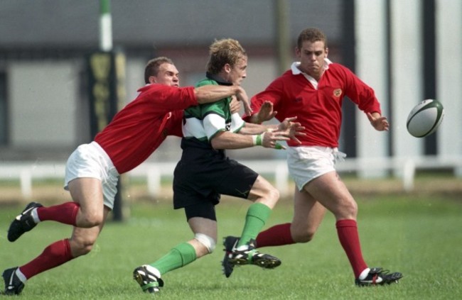 Pat Duignan tackled by Sean McCahill